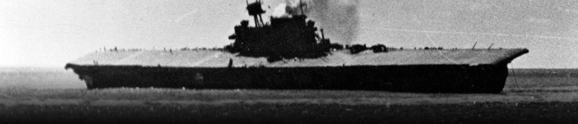 Image: USS Yorktown (CV-5) dead in the water and listing heavily, shortly after being hit by two Japanese Type 91 aerial torpedoes 